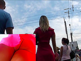 Blonde gal in a-line skirt captured on upskirt camera