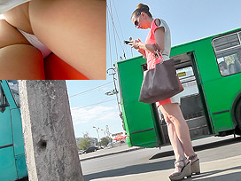 Young peach presents skinny ass in upskirt in public