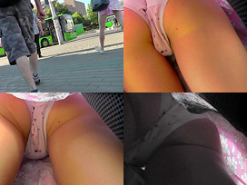 A public upskirt voyeur clip of a girl's bum in black thong